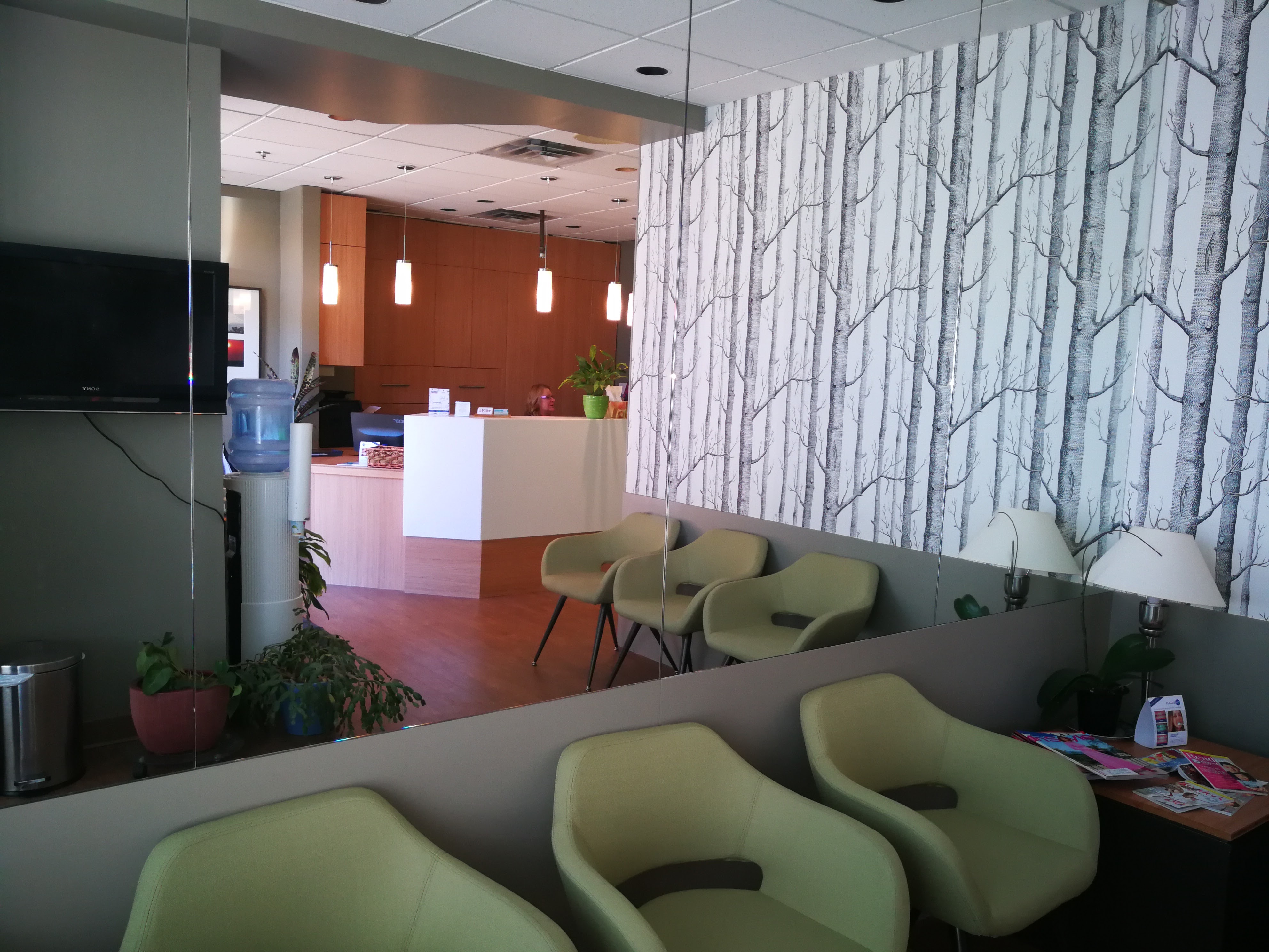 Reception and waiting area at Edgemont Village Dental Centre