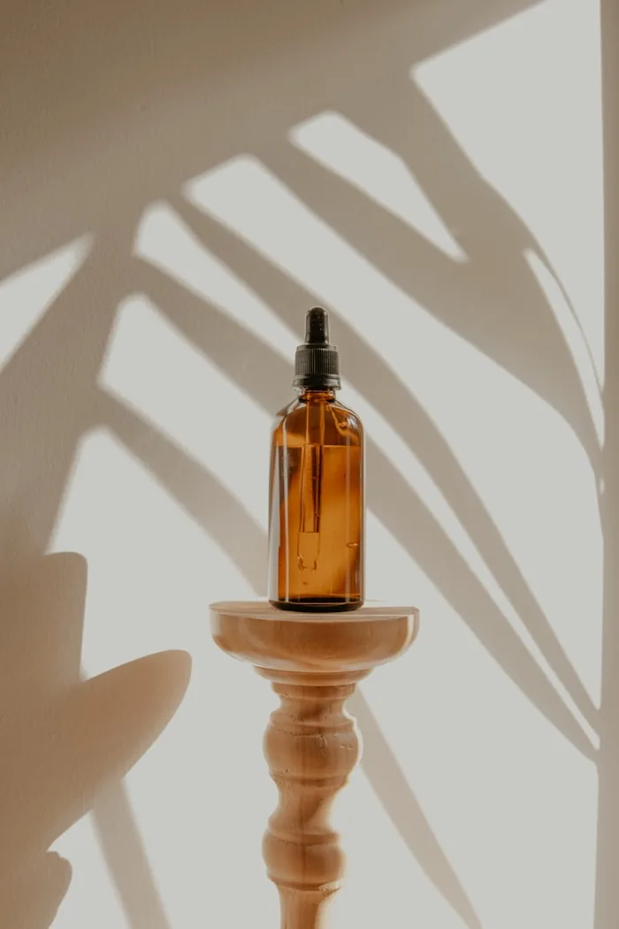 Treatment oil in an amber glass bottle