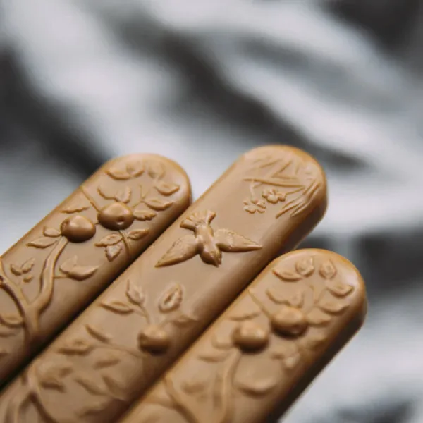 Close-up of Living Lotus blonde chocolate botanical mould