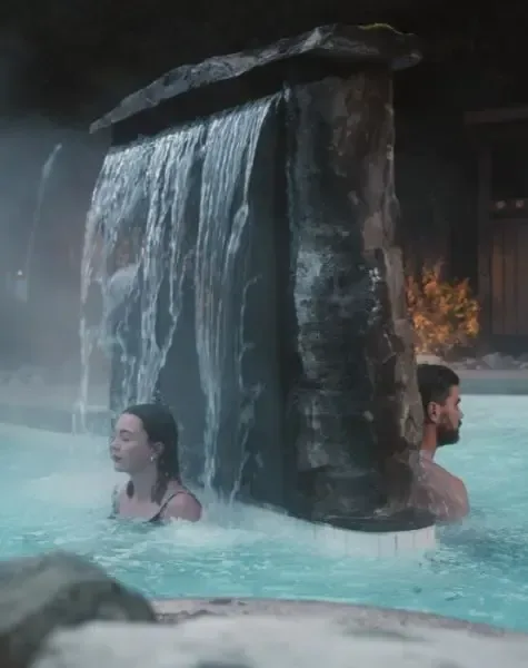 Guests enjoying the thermal waterfall